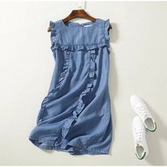 Silhouette: StraightOrigin: CN(Origin)Season: SummerNeckline: O-NeckSleeve Style: TANKDecoration: RUFFLESStyle: CasualDresses Length: Above Knee, MiniMaterial: COTTONMaterial: DenimAge: Ages 18-35 Years OldModel Number: AM5296Sleeve Length(cm): SleevelessGender: WOMENWaistline: empirePattern Type: Solid Short One Piece Dress, Sundress Short, Blue Denim Dress, Soft Jeans, Summer Sundress, Ruffles Fashion, Short Denim, Mini Robes, Denim Mini Dress