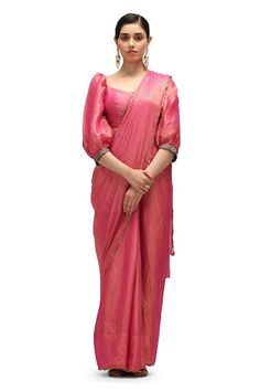 Fuchsia pink saree crafted in chiffon silk with all over zari striped woven detail and scallop border. Paired with a matching woven puffed sleeves blouse with floral embroidery on the sleeves hem. - Aza Fashions Puffed Sleeves Blouse, Cotton Sarees Handloom, Saree Women, Scallop Border, Women Saree, Embroidered Sleeves, Saree Blouses, Lehenga Saree, Pink Saree