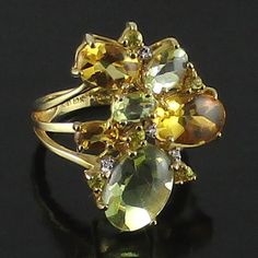 10k Yellow Gold Citrus Gemstone Ring - Size 5 - Stamped 10k - Made In Thailand - Measures 3/4" Long X 1/2" Wide This Is A Freeform Cluster Of Oval Brazilian Lime Quartz, Citrine, Sri Lanka Yellow Sapphires And Round Diamond Accents. Yellow Multi-stone Round Gemstones, Yellow Gemstones With Accents Fine Jewelry, Fine Jewelry Yellow Multi-stone Rings, Yellow Multi-stone Rings For Formal Occasions, Formal Yellow Multi-stone Rings, Formal Yellow Multi-stone Jewelry, Yellow Multi-stone Fine Jewelry, Yellow Gold Citrine Gemstones With Multi-stone Detail, Yellow Gold Cluster Rings With Multi-stone