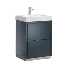 a white sink sitting next to a gray cabinet