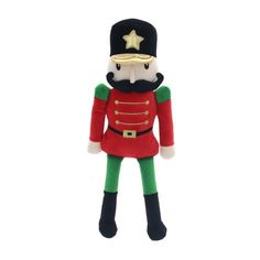 a toy soldier with a star on his hat and green pants, standing in front of a white background