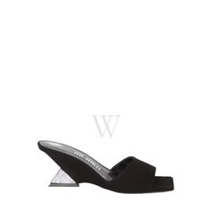 The Attico Ladies Sandals. SKU: 236WS605 TL08 212. Color: Silver/Black. The Attico Cheope Black And Silver Wedge Mule. The 'Cheope' mule in black suede exudes elegance and glamour with its intricate detailing of crystal thermo-adhesive rhinestones. The black suede material lends a luxurious texture, complemented by the shimmering rhinestones arranged in a captivating design across the upper. Featuring a pyramidal wedge heel standing at 60mm, it offers a balanced lift for comfort and style. This slip-on style mule includes a branded insole for added comfort, while its open toes add a touch of sophistication, making it a versatile and chic choice for various occasions where both style and comfort are paramount. Made in Italy. Please visit the brand website for sizing information. Silver Wedges, Wedge Mules, Ladies Sandals, Brand Website, The Attico, Suede Material, Black And Silver, Wedge Heels, Slip On Shoes