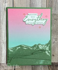 a handmade greeting card with mountains and the words wishing you everything wonderful on it