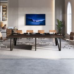 a large conference table with chairs around it