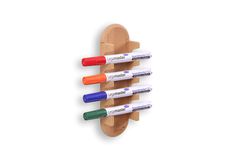 a wooden rack with four markers on the front and one marker in the back that is attached to it