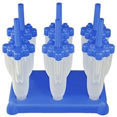 four blue and white plastic toothbrush holders on a blue holder with six small toothbrushes sticking out of them