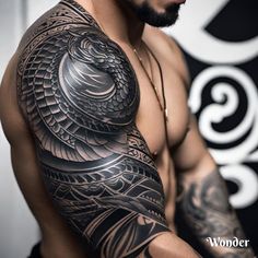 a man with tattoos on his arm and shoulder