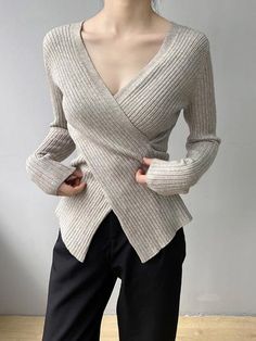 V-neck Knit Top For Winter Layering, Stretch V-neck Sweater For Layering, Versatile V-neck Tops For Winter, Gray Ribbed V-neck Top, Fitted Knitted V-neck Top, V-neck Stretch Cardigan For Winter, Winter V-neck Top, Fitted Knitted V-neck Sweater, Gray V-neck Top For Winter