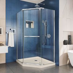 a bathroom with blue walls and tile flooring, including a walk in shower stall