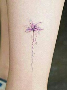 a small flower tattoo on the ankle that says, i love you in cursive writing