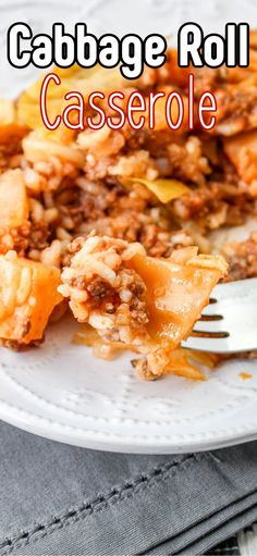 cabbage roll casserole is on a white plate with a fork and silverware