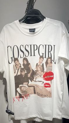 a white t - shirt with the words gossipgirl on it