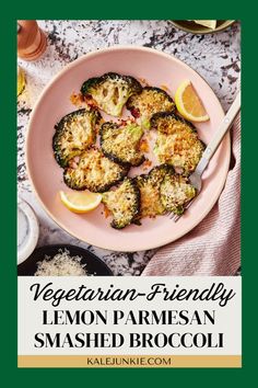 a pink plate topped with lemon parmesan smashed broccoli