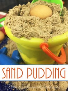 sand puddinging in a bucket with an egg on top and the words sand puddinging below it