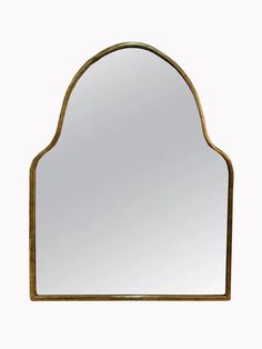 a mirror that is sitting on top of a table