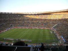 a soccer stadium filled with lots of people