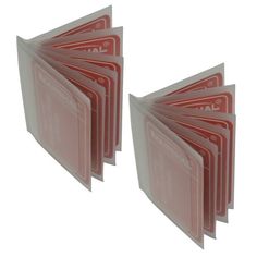 a stack of red business cards sitting on top of each other