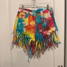 tie dye shorts hanging on a door hanger