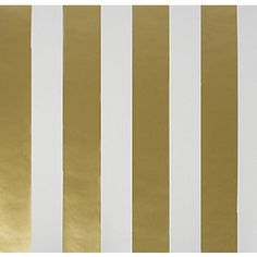 a white and gold striped wallpaper with stripes