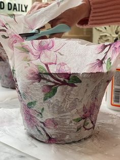 I love terra cotta pots and I thought it might be fun to try a decoupage project with some napkins. I used some old terra cotta pots and made these adorable pots for some lavender.