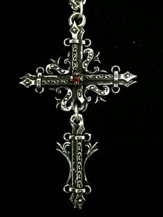 This Gothic Cross necklace is an handmade pewter sculpture orned with a gemstone of your choice :) This Gothic Cross Pendant is sold with a stainless steel chain This Gothic Cross is a pendant of 7.5cm  This Gothic Cross Necklace is a pewter sculpture of my own creation, i create and work the metal by myself at home. The material used is the finest and highest grade hypoallergenic pewter alloy of 98%tin Wholesale is available for stores, if you are interested please contact me about that :) Than Silver Ankh Gothic Necklace, Gothic Metal Cross Pendant Jewelry, Gothic Metal Cross Jewelry, Gothic Cross Pendant Jewelry, Gothic Cross Metal Jewelry, Gothic Metal Cross Necklace, Gothic Silver Metal Cross Necklace, Gothic Crucifix Cross Necklace As Gift, Gothic Crucifix Cross Necklace For Gift