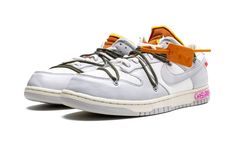 The Off-White x Nike Dunk Low “Lot 22” is one of 50 colorways of the retro basketball shoe designed by Virgil Abloh and Nike for its “Lot 50” collaboration.  An August 2021 release, the “Lot 50” pack follows Off-White and Nike’s impressive “The 10” collaboration from 2017, one of the most desirable sneaker collections ever made.  On “Lot 22,” Sail-colored canvas appears on the base and Neutral Grey leather is found on the forefoot, eyelets, collar, heel, and Swoosh.  A secondary, bungee cord-lik Nike Dunk Low Off White, Nike X Travis Scott, Low Air Jordan 1, Jordan 8, Dunks Nike, Jordan 2, Nike Dunk High, Nike Shox, Air Jordan 3