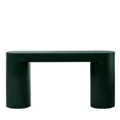 a green table that is on top of a white wall and has a black base