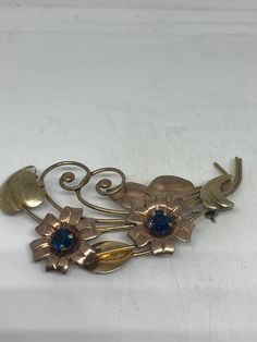 Vintage Flower Gold filled Brooch Pin Vintage Unusually crafted Set with blue Crystal Over an inch All jewelry is shipped free in the US in a nice gift box. Check out our over a THOUSAND great reviews Engraving is $4 per letter and is not always perfect depending on the piece. It can take a few days if the jeweler is busy. This is payable to Paypal Judithsltd@gmail.com Flower Shaped Brooch Jewelry As Gift, Blue Flower-shaped Jewelry Brooch, Blue Floral Brooch Jewelry, Flower Shaped Costume Jewelry Brooch, Craft Set, Heart Locket, Vintage Jewellery, Blue Crystals, Gold Details