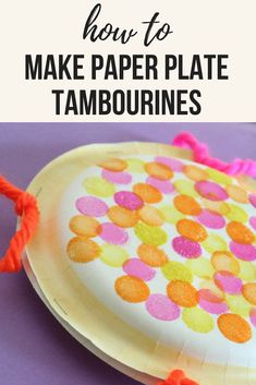 a paper plate that has been made to look like a tambourine on it