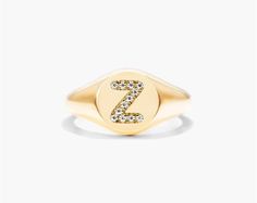 14K Yellow Gold Diamond Z Initial Signet Ring. This timeless ring will dazzle all who see it. Perfect for any age and occasion, this ring makes the perfect individualized gift! Signet Ring With Brilliant Cut As A Gift, Yellow Gold Initial Ring With Vs Clarity, Brilliant Cut Signet Ring As Gift, Gift Signet Ring With Brilliant Cut, Open Ring Signet With Brilliant Cut For Gift, Brilliant Cut Open Signet Ring As Gift, Brilliant Cut Open Signet Ring Gift, Personalized Yellow Gold Diamond Ring, Gift Yellow Gold Engraved Ring With Brilliant Cut