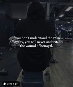 a person sitting on a bench in a gym with the words if you don't understand