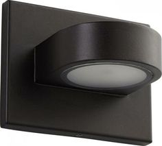 a black light that is on the side of a wall mounted fixture with a white light