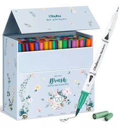 the crayon set is in its box with markers