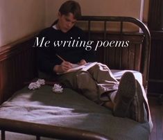 a young man sitting on top of a bed writing in a book with the caption me writing poem