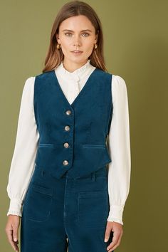 Get that retro vibe this season in this button up waistcoat. With matching trousers available to purchase separately, to complete the fit, In a V neck design, with pockets, button details and a slight stretch for a comfortable fit. Corduroy Vest, V Neck Design, Cord Trousers, Women's Coats & Jackets, Retro Vibe, Leggings Shop, Long Sleeve Maxi Dress, Wide Leg Trousers, Neck Designs