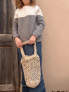 This cute handbag is lightweight and very durable! This bag is great for grocery shopping, shopping at a local farmers market, picnics to the park, and much more! Finish size without the straps is it 14" x 11" without items. It stretches some when items are placed in the bag. After you use it several times and it stretched a little bigger than you like, wash it and dry it and it will return back to its original size. Recommended to air dry but it is machine dryable as well. Casual Cream Square Hobo Bag, Casual Square Hobo Bag For Summer, Casual Summer Square Hobo Bag, Casual Fall Hobo Bag For Shopping, Spring Hobo Bag For Daily Use, Eco-friendly Lightweight Crochet Bag For Spring, Casual Beige Crochet Tote Bag, Casual Natural Hobo Tote Bag, Casual Fall Bucket Bag For Shopping