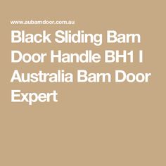 the black sliding barn door handle bh1 australia barn door expert logo is shown