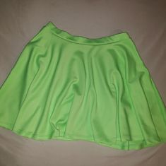 This Beautiful Skirt Can Be Worn So Many Ways. This Skirt Is Brand New Never Worn Before. Size Large Green Stretch Flared Skirt, Stretch Green Spring Skirt, Green Stretch Skirt For Spring, Green Stretch Skort, Green Stretch Pleated Skort, Green Stretch Short Skirt, Stretch Green Pleated Skort, Trendy Green Flared Skirt Bottoms, Green Flowy Skort In Short Length