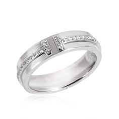 TIFFANY & Co. 18K White Gold 4.5mm Wide Diamond T Ring 5  Metal: 18K White Gold  Size: 5  Band Width: 4.5mm  Weight: 5.80 grams  Diamond: round brilliant diamonds, carat total weight .13   Hallmark: ©TIFFANY&Co. AU750 ITALY  Condition: Excellent condition, like new, comes with Tiffany box   Tiffany Price: $4,100 Authenticity Guaranteed Tiffany & Co, Tiffany And Co Rings, Tiffany And Co Ring, Rose Outfit, T Ring, Tiffany Ring, Tiffany Co Rings, Tiffany Rings, Tiffany T