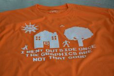 an orange t - shirt that says i met outside once the graphics are not that good