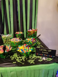 a table topped with lots of candy and candies