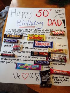 a birthday card with candy bars on it and the words happy 50th dad written on it