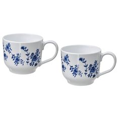 two blue and white cups with flowers on them