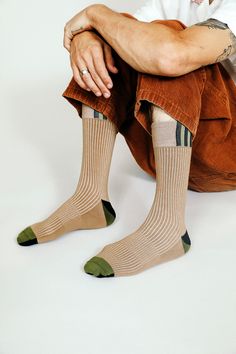 Our Split Crew gives a twist to your everyday basic. This premium combed cotton sock feature a larger cuff with side stripe detail a terry footbed and arch support. Size+ OSFA, M 9-12 Design+ 200 Needle+ Reinforced toe & heel+ Seamless toe+ Classic Ribbed Tube Sock+ Terry Cushioning on Footbed+ Crew Content + Care+ Premium Combed Cotton+ Wash Cold/Dry Low+ Imported Luxury Classic Men's Socks, Stretch Cotton Socks In Beige, Stretch Beige Cotton Socks, Beige Stretch Cotton Socks, Casual Fitted Socks With Ribbed Cuffs, Striped Cotton Socks For Winter, Beige Cotton Socks For Winter, Ribbed Cotton Mid-calf Socks, Classic Mid-calf Cotton Socks