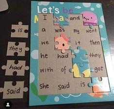 there is a piece of puzzle on the table with words and pictures to put in it