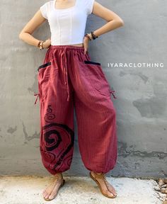 The harem style trousers made from cotton fabric 100%with an elasticated smock waist and ankles they provide a comfortable lightweight fit, perfect for casual wear, festivals, yoga, holidays as well as pairing with a plain top to get that popular look.   Materials: Cotton Sizing: One size fits most. Size : (inches) ✿Waist : 22-42 inch ( 55-106 cm ) ✿ Hip :up to 49 inch ( 124 cm) ✿ Length 39" ( 100 cm ) ✿2 sides pockets S I Z E : US SIZE 4 - 12 , UK SIZE 8 - 16 , EU SIZE 36 - 44 MODEL SIZE : size 6 (US) with 26" waist, 34" hip and 5'5" tall S H  IP P I N G   P O L  I C I E S : * We ship within 1-3 business days of cleared payment  * All orders are tracked with registered air mail S H  I P P I N G  T I M E : * USA , UK 9 - 15 working days * Europe 9-18 working days  * Australia 7-12 working Summer Cotton Harem Pants With Loosely Fitted Hips, Ankle-length Relaxed Fit Harem Pants, Relaxed Fit Hippie Harem Pants With Pockets, Bohemian Cotton Pants With Pockets, Bohemian Parachute Pants With Pockets, Summer Harem Parachute Pants With Elastic Waistband, Bohemian Harem Pants With Pockets, Casual Cotton Harem Pants For Yoga, Bohemian Relaxed Fit Parachute Pants With Pockets