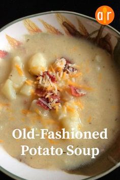 an old - fashioned potato soup in a white bowl on a black table with the words old - fashioned potato soup