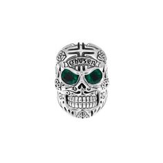 Large Skull Ring with Chosen Cross Detail and Green Emerald Eyes on white background Green Symbolic Sterling Silver Jewelry, Symbolic Green Sterling Silver Jewelry, Symbolic White Gold Skull Ring For Anniversary, Classic Sterling Silver Skull Ring For Anniversary, Anniversary Skull Ring In White Gold And Sterling Silver, Symbolic Hallmarked Skull Ring For Anniversary, Sterling Silver Emerald Ring Collectible, Collectible Sterling Silver Emerald Ring, Sterling Silver Hallmarked Skull Ring Collectible