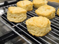 some biscuits are cooking on a grill