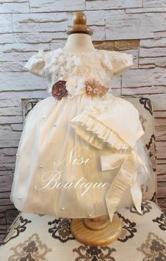 "★Ivory Christening Gown, Baptism Dress★ ★Occasion: Baptism, Child Blessing or any Special Occasion ★Comes With: Dress and Bonnet ★Measurements 6-9 months, (Long 17\") (Waist 19\")   9-12 months, (Long 20\") (Waist 21\")   12-18 months, (Long 21\") (Waist 22\")   18-24 months, (Long 22\") (Waist 23\")   -Waist measurement is around ★Features: The back is open, for comfort when you load the baby (The waist is adjustable, has two ribbons to make a bow, as in the photo) Please check the measurements, and any questions send me a message,  your satisfaction is very important for me Comes with a Dress Bag Dry Clean Only" Elegant Beige First Communion Dress, Elegant Beige Dress For First Communion, Cream Ruffled First Communion Dress For Baptism, Elegant Cream Baptism Dress For First Communion, Cream Ruffled Gown For Baptism, Cream Baptism Dress With Ruffles For Pageant, Pageant Baptism Dress In Cream With Ruffles, Cream Baptism Dress For Ceremony, Fitted Cream First Communion Dress With Ruffles